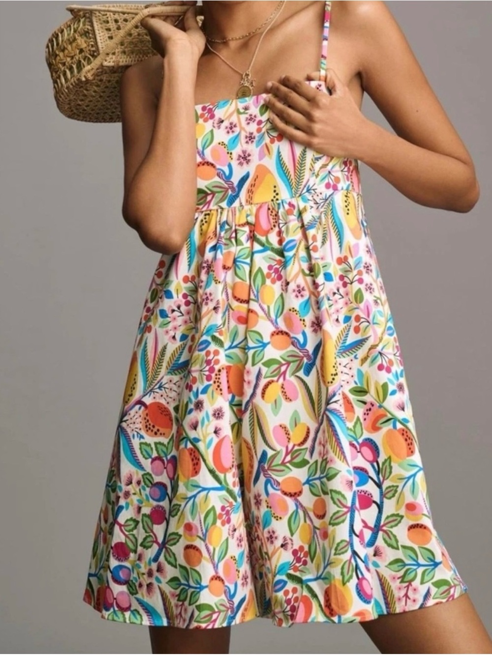 Anthropologie Hutch Bandeau Romper in a tropical fruit floral print.